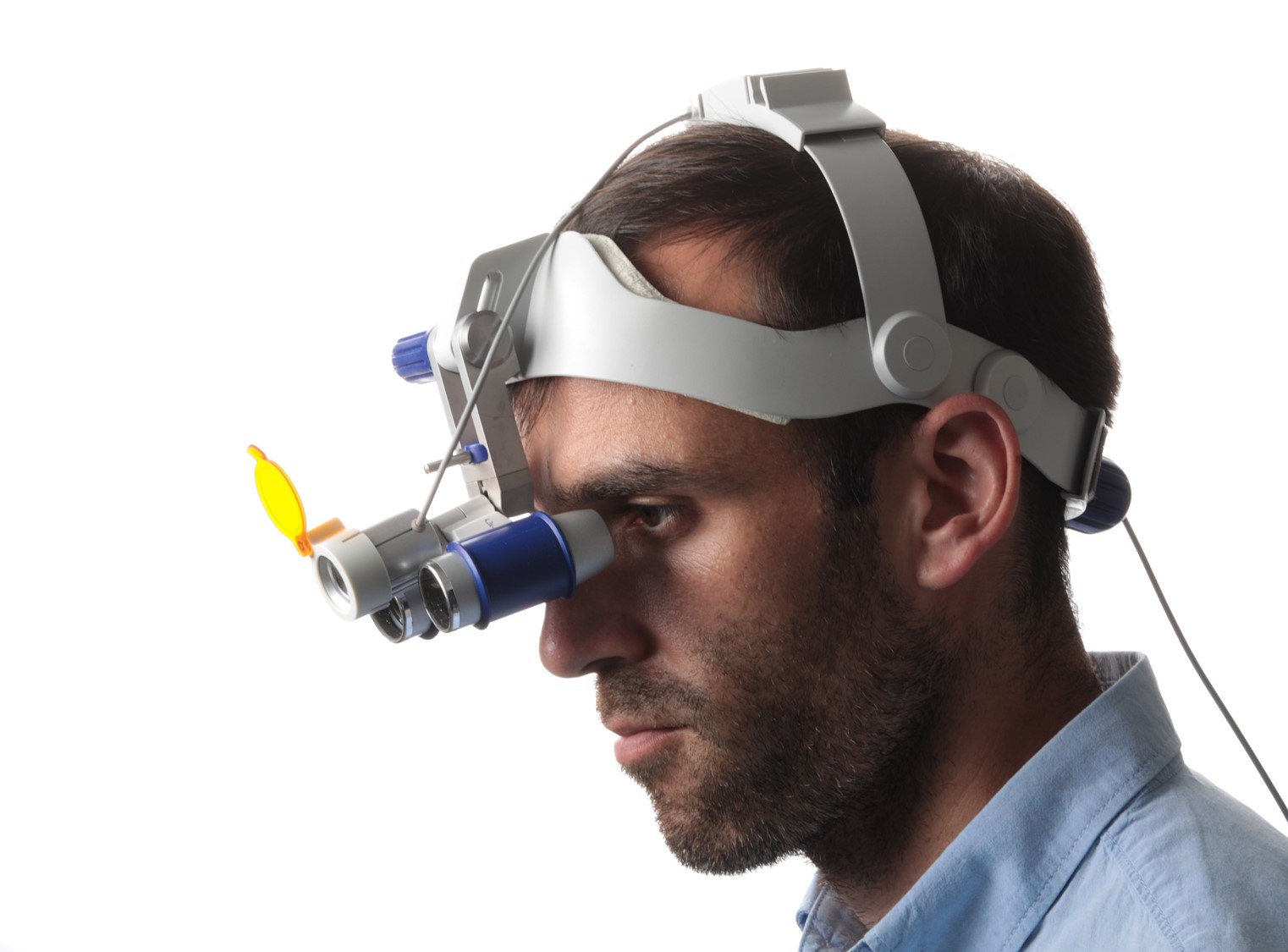 Dr David Huson wearing a magnification headset with integrated light